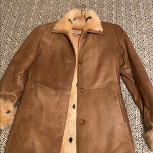 Completely fur lined leather coat